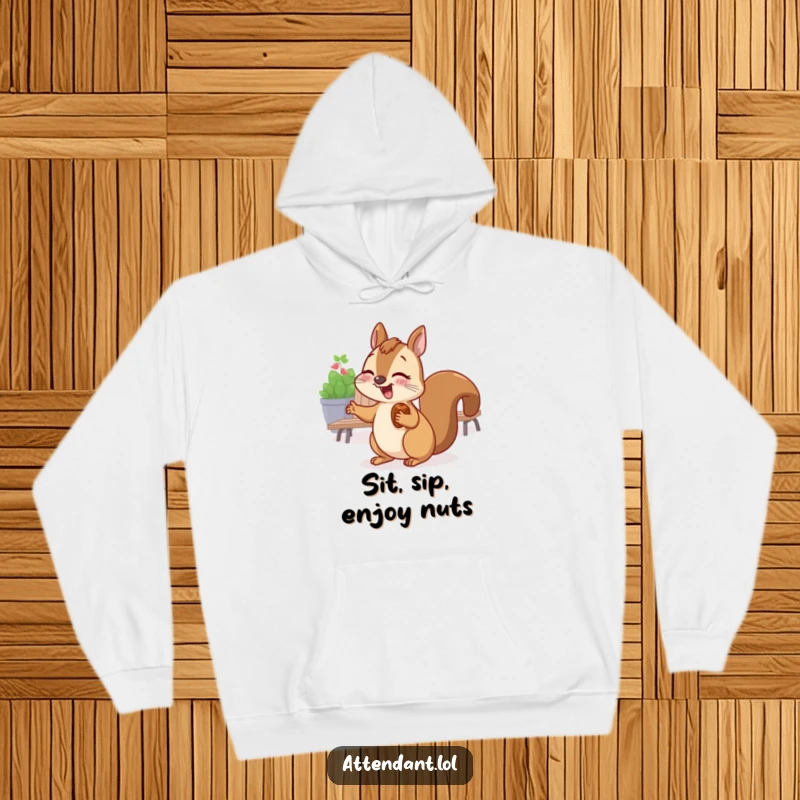 Funny hoodie showcasing a giggling squirrel with a nut in its cheek, gesturing towards a cozy seating area.