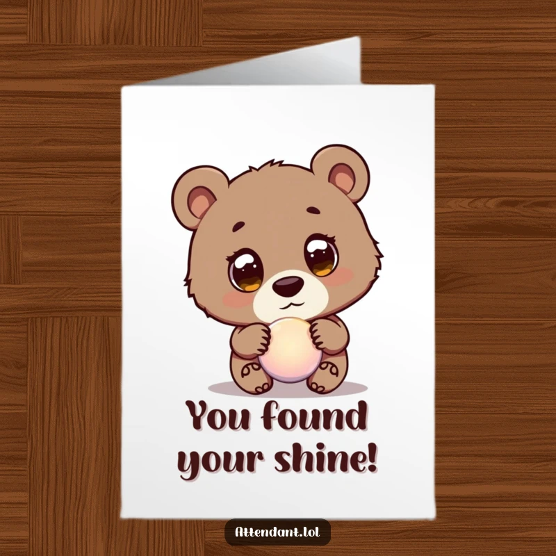Free Printable Bear Cub Congratulations Card: Curious bear cub with wide eyes guides a glowing orb, illuminating your path to success.